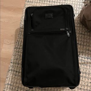 Tumi suitcase - used but still functional